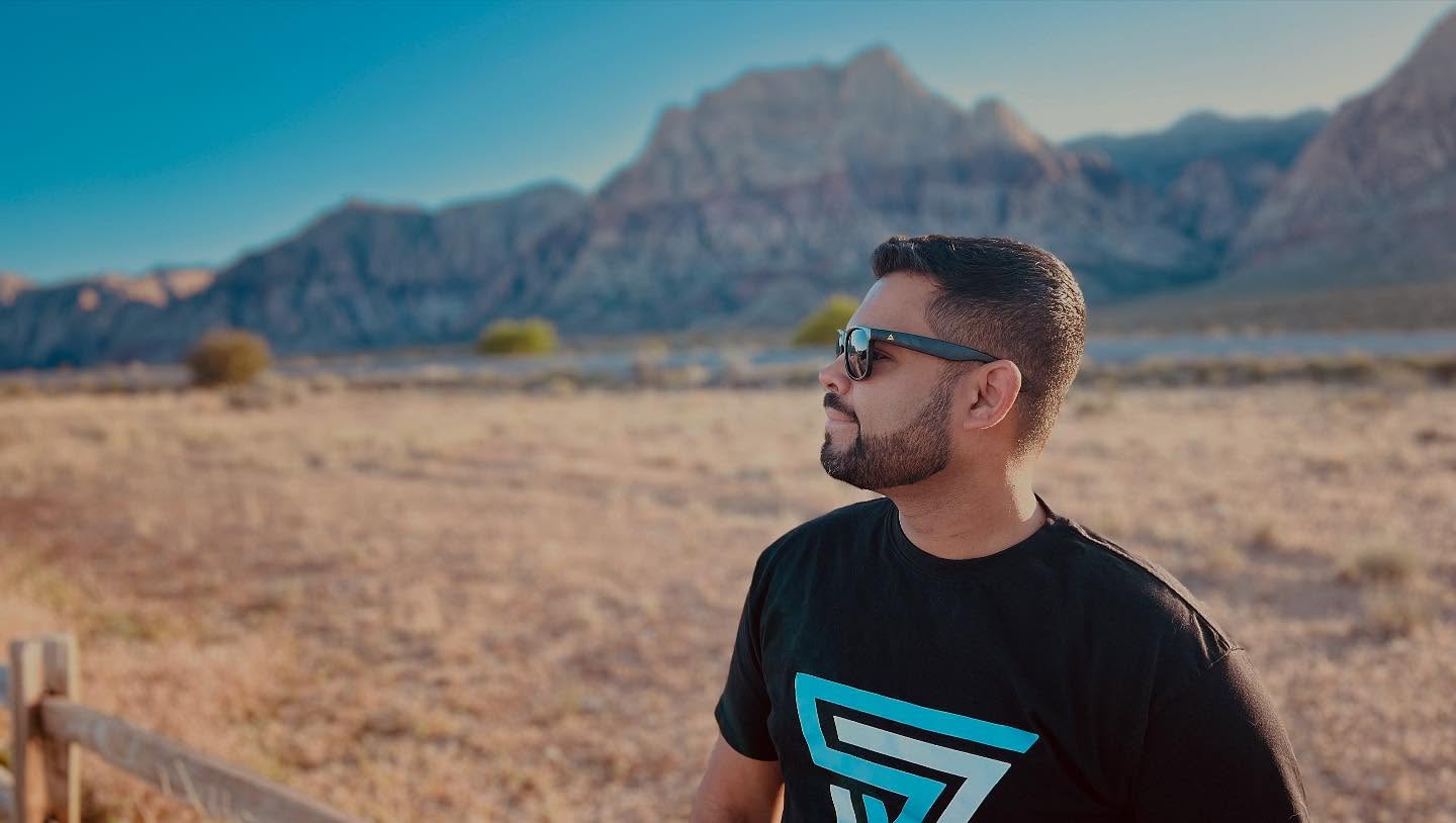 Sony Jacob looking toward the desert mountains